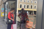 Jo looking in shop window